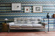 8 Holland Street Christopher Farr Cloth showroom interior celebrating the Anni Albers collection, featuring a Black Mountain upholstered chair and Child’s Check wallpaper in a modern mid-century design setting.
